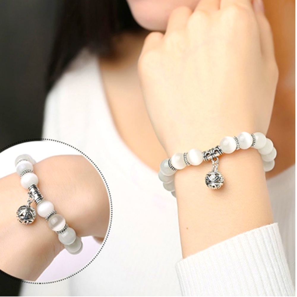 Charm bracelet white opal beads and titanium
